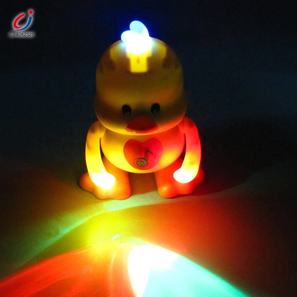 Chengji swing duck children toy educational plastic electronic walking dancing yellow duck electric music toys with color lights