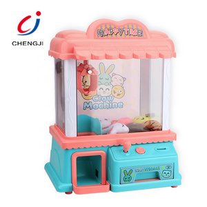 Electronic doll candy light up mini machine music plastic mini toy claw machine