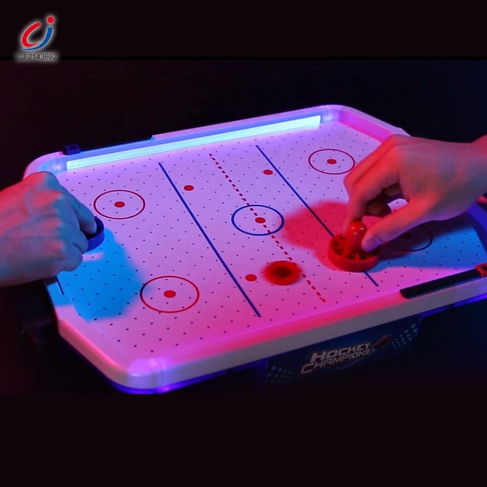 Chengji kids educational indoor sport play set electric musical lighting suspended table top mini ice hockey game toy