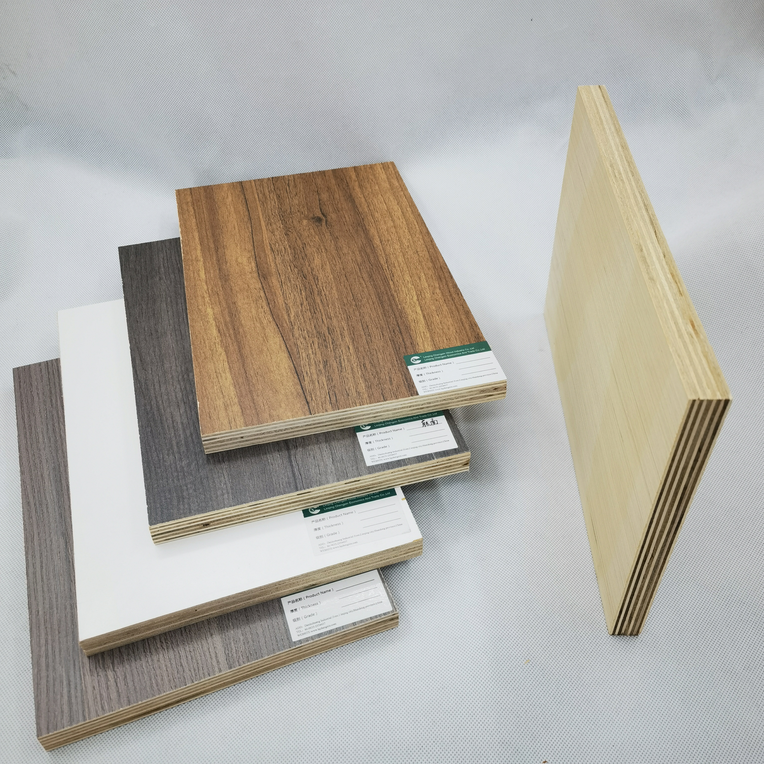 Laminated Ply wood  China Poplar Plywood 3mm 5mm Plywood Price White Melamine Faced Decorative Plywood Panels