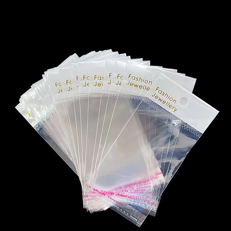 gilding printed fashion jewellery poly bag white header plastic pouch with hot stamping gold logo clear self adhesive seal bags