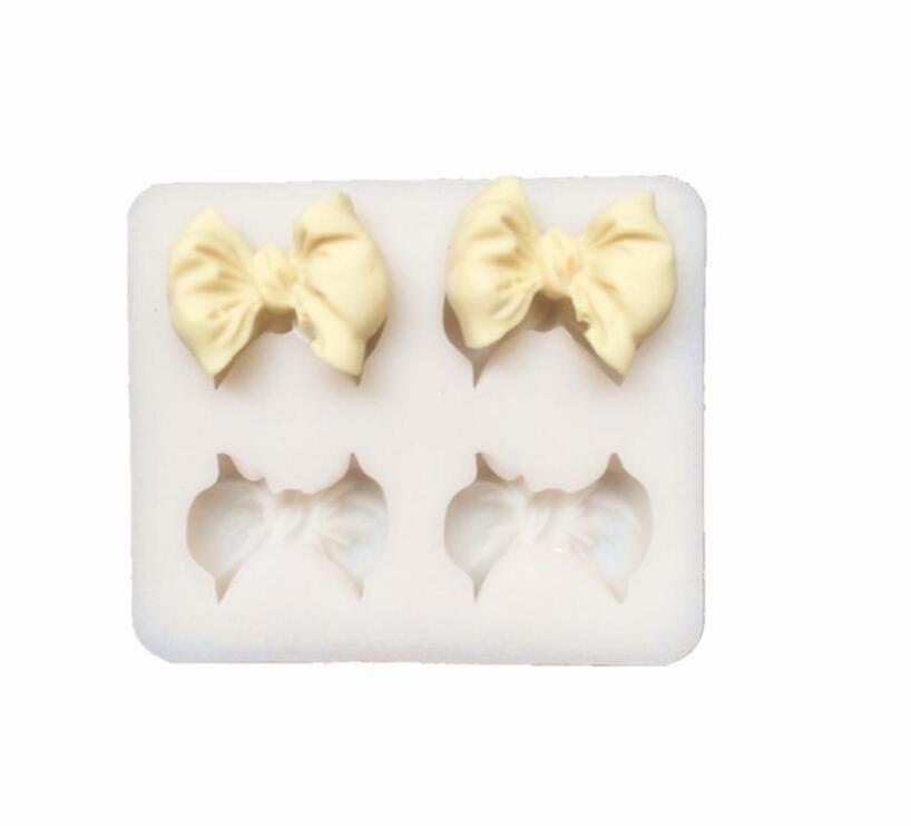 s45k50 Silicone Mold 1inch 4 hole bow knot silicone mold mould sugar craft fondant cake decorating baking tool