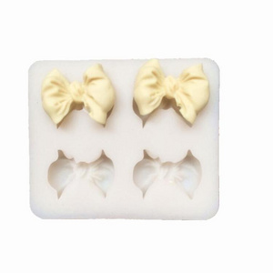 s45k50 Silicone Mold 1inch 4 hole bow knot silicone mold mould sugar craft fondant cake decorating baking tool