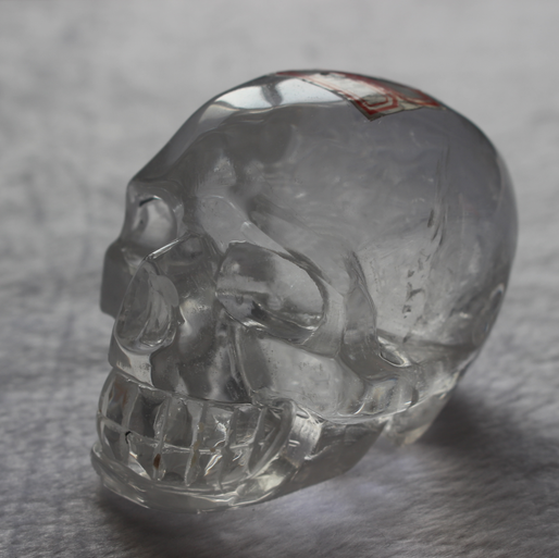 High Quality Beautiful Hand Carved Polished Clear Quartz Crystal Skull with Rainbow Crackle for Decoration