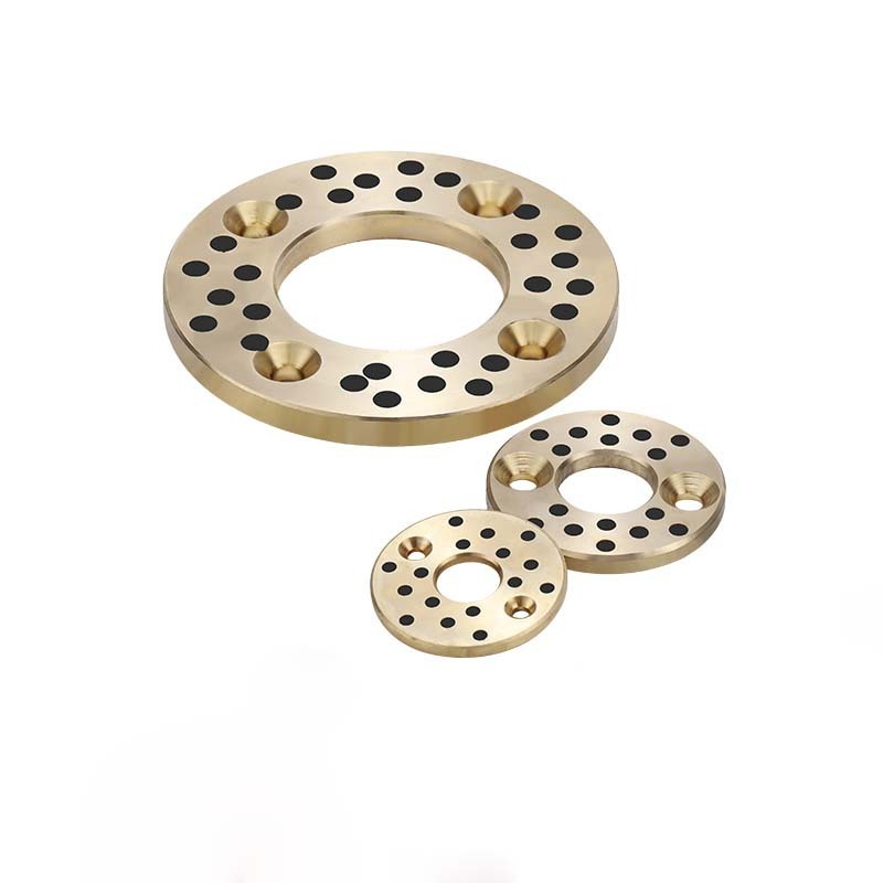 Thrust washers with counter bores copper alloy solid lubricant