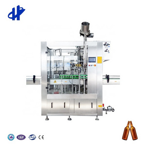 6 Filling Valves Isobaric Beer Glass Bottle Filler 3 In 1 Filling Line From Shandong HG Machinery Co., Ltd