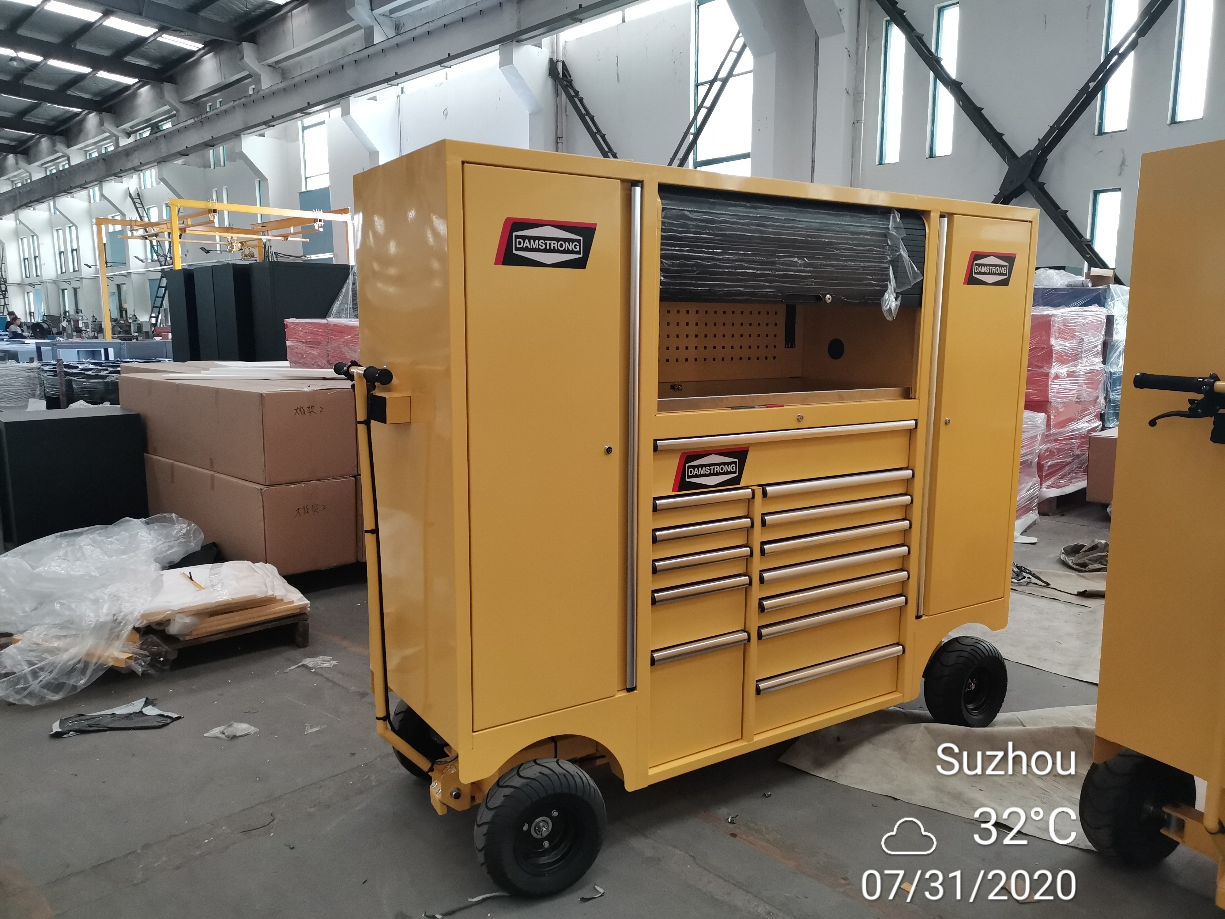 GLMrsBig Pit cart tool box and metal cabinet with rolling trolley consists of a metal frame with several shelves or drawers