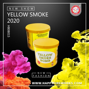 Yellow color smoke bomb colorful bombs smoking torch colored canned fireworks wedding party photograph