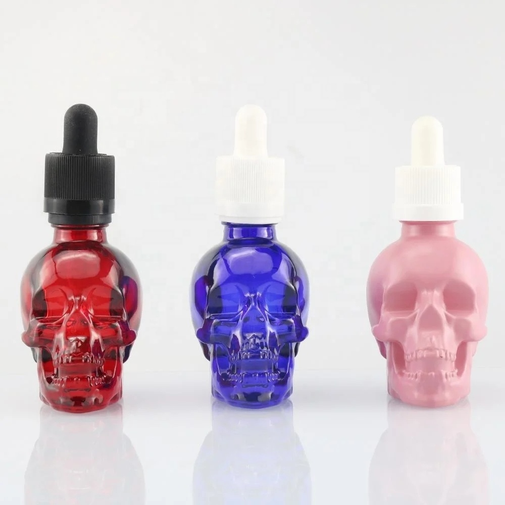 customized unique perfume 30ml 60ml 120ml skin care packaging skull head shape glass skull 1oz glass beard oil dropper bottle