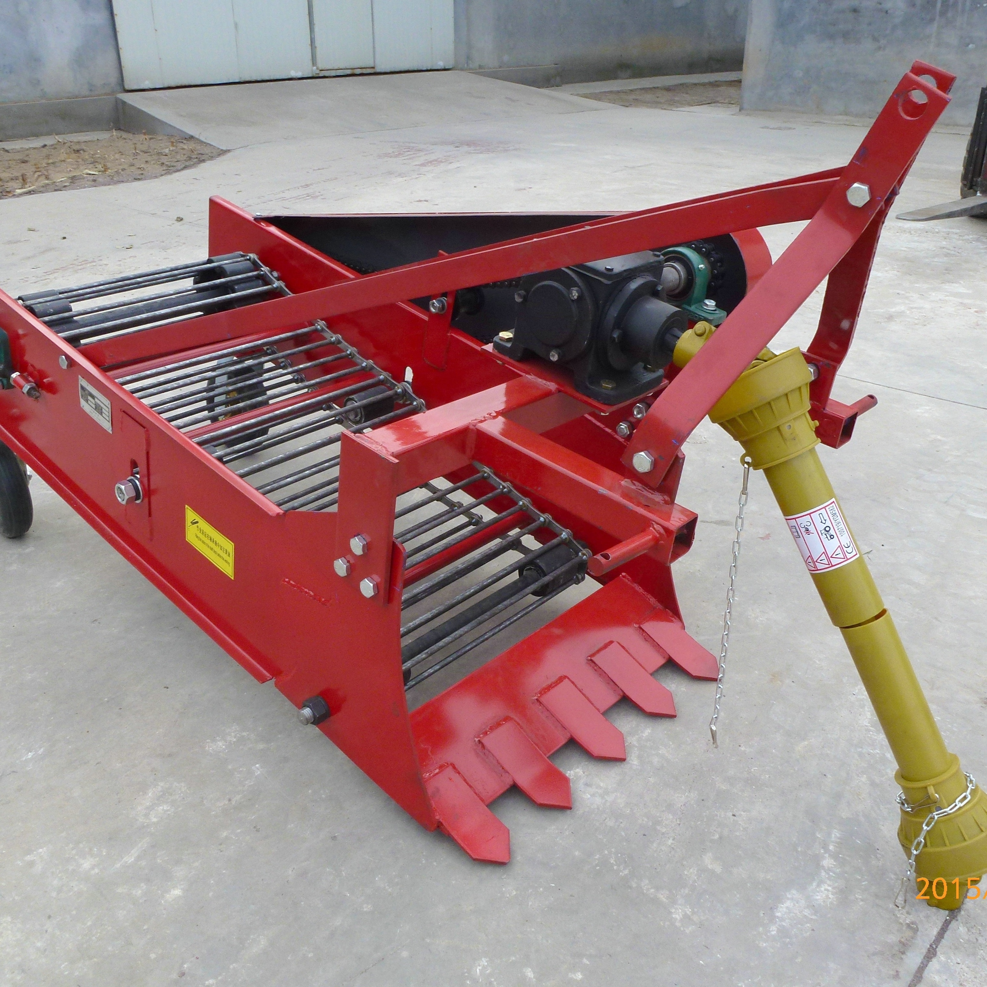 One row potato harvester for power tiller