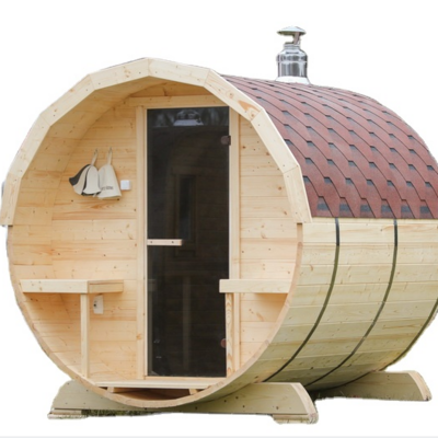 Traditional 6 Person red cedar wood barrel sauna room with wood burning stove heater and stone