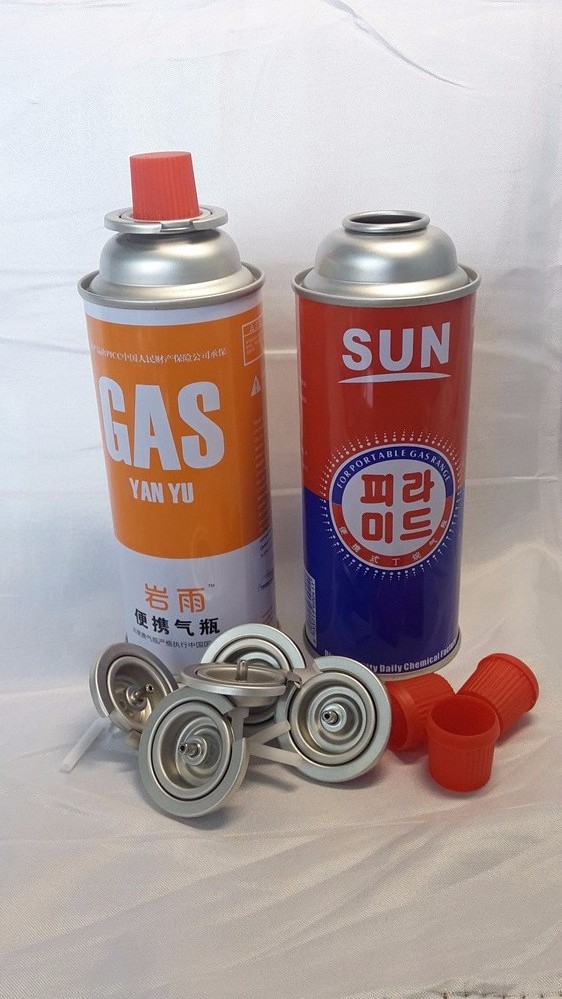 empty Butane gas cartridge and butane gas can