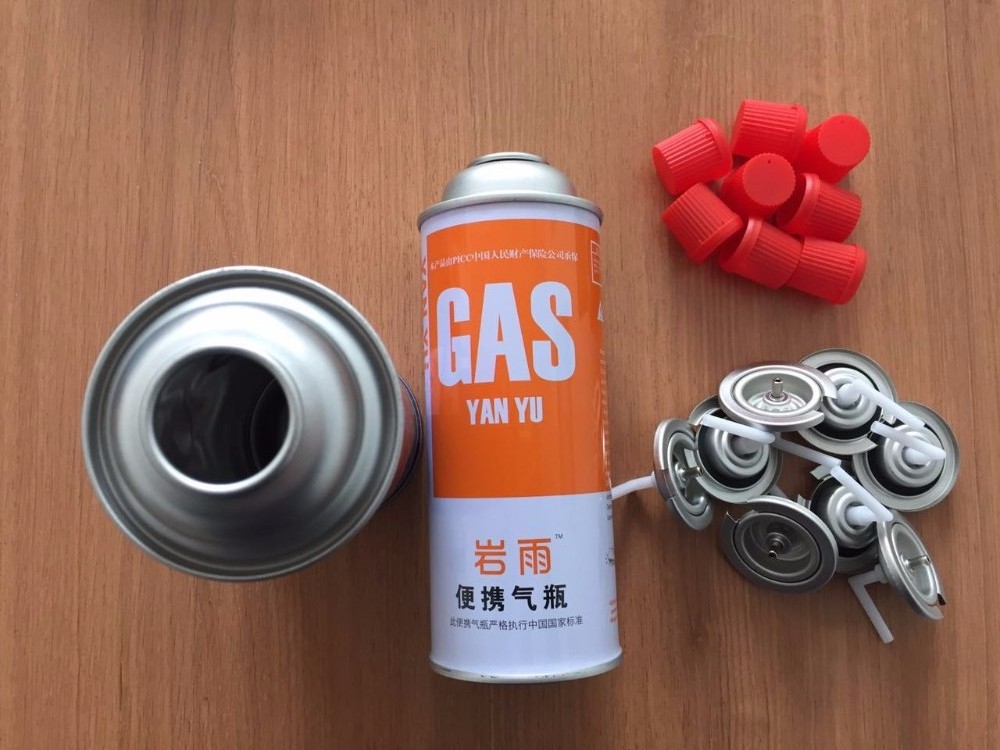 empty Butane gas cartridge and butane gas can