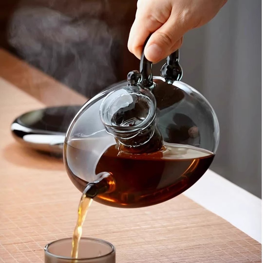 High-temperature glass teapot tea-making device scented tea water separation electric ceramic stove light luxury tea set