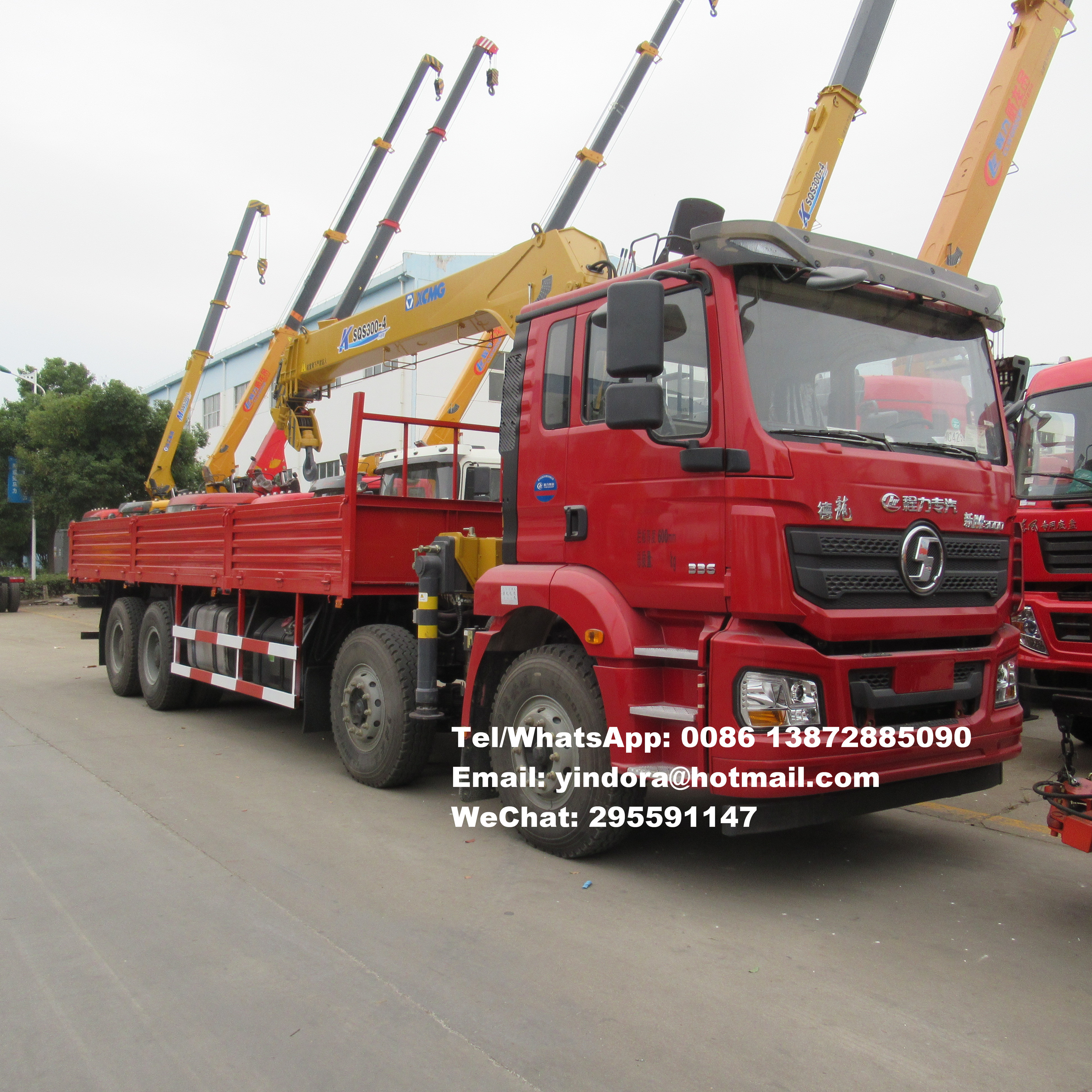 Shacman 8x4 12 wheeler telescopic knuckle boom 25 ton lorry truck crane 25 ton hydraulic lifting arm truck crane