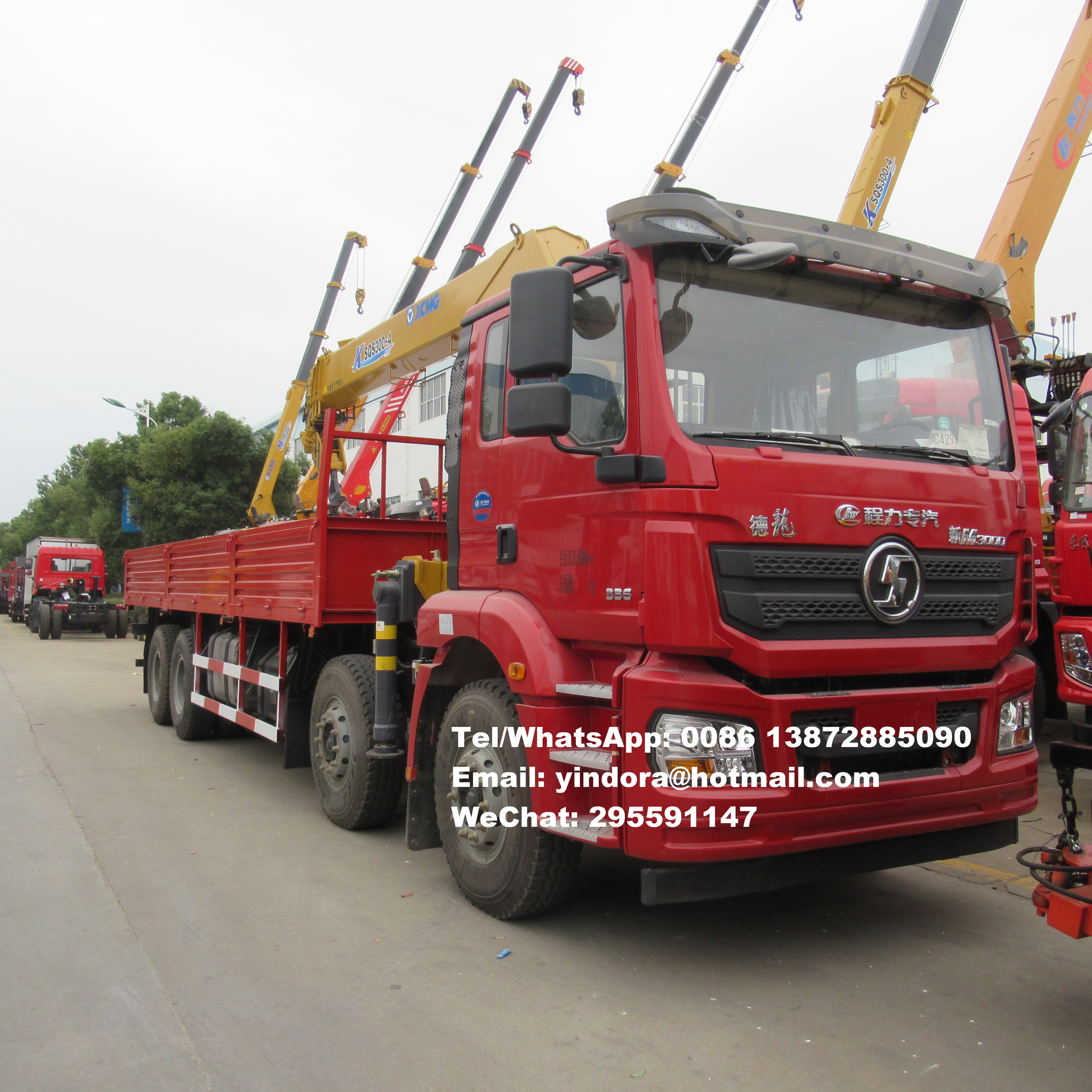 Shacman 8x4 12 wheeler telescopic knuckle boom 25 ton lorry truck crane 25 ton hydraulic lifting arm truck crane