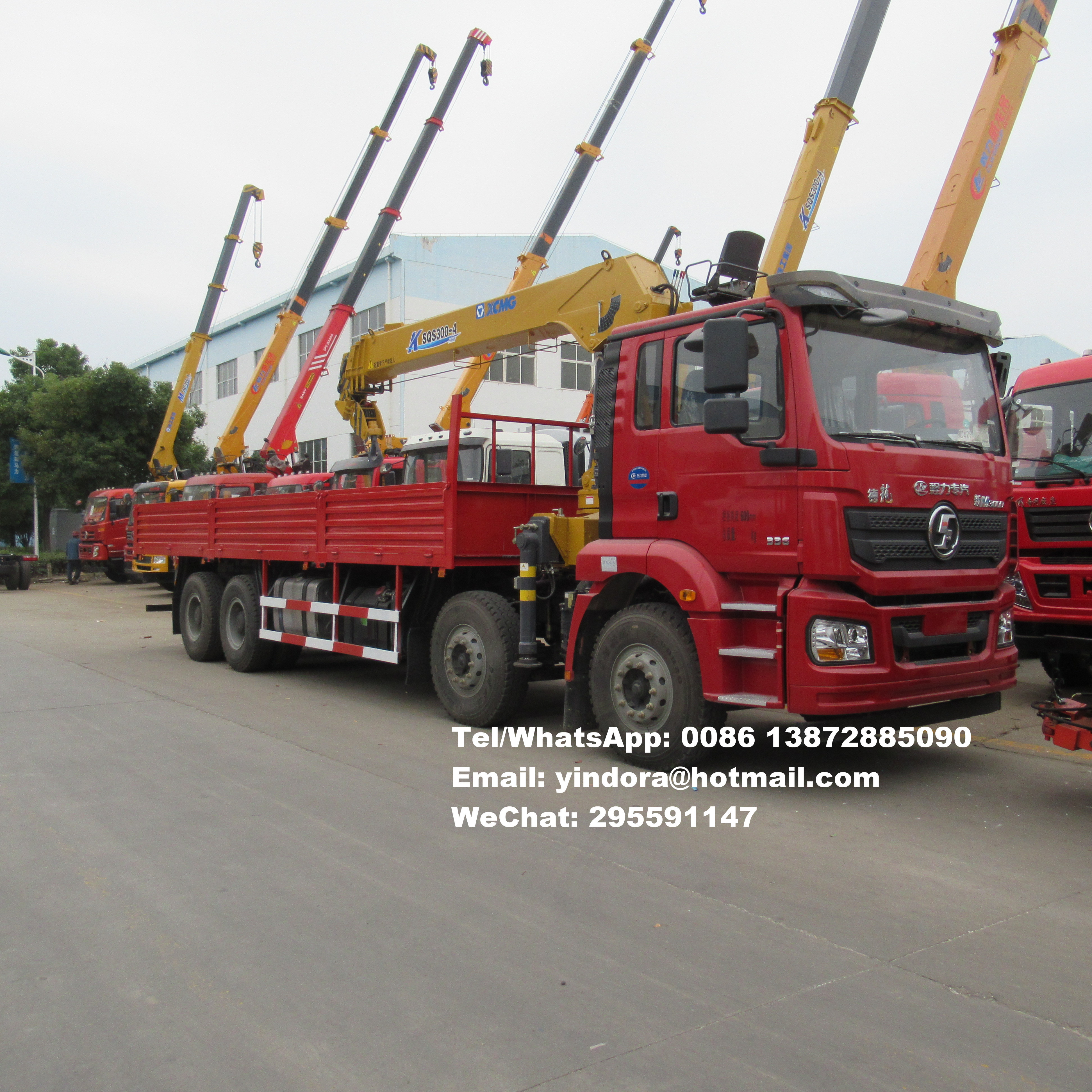 Shacman 8x4 12 wheeler telescopic knuckle boom 25 ton lorry truck crane 25 ton hydraulic lifting arm truck crane