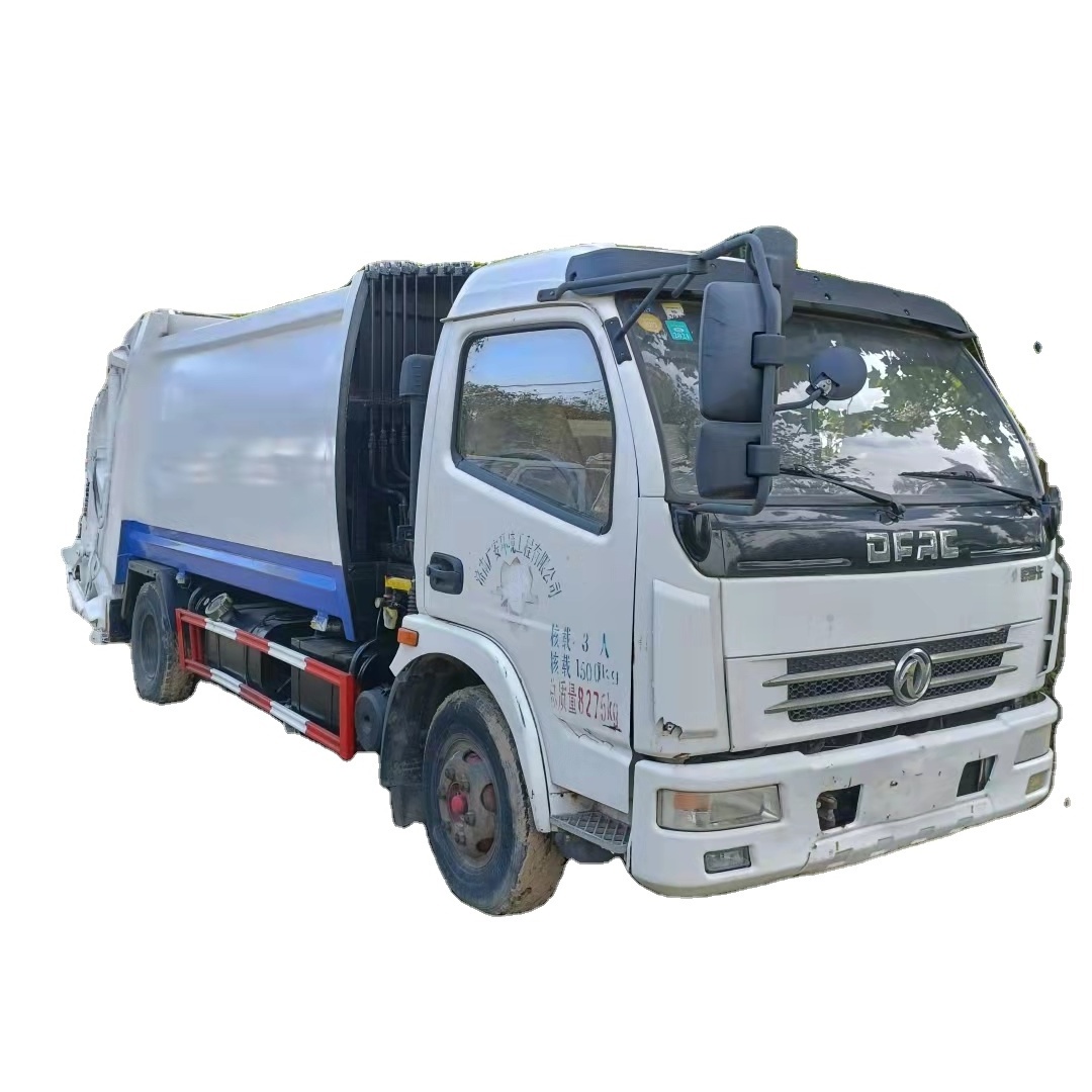 Low price Dongfeng 4x2 used mini garbage trucks 8m3 garbage compactor truck for sale