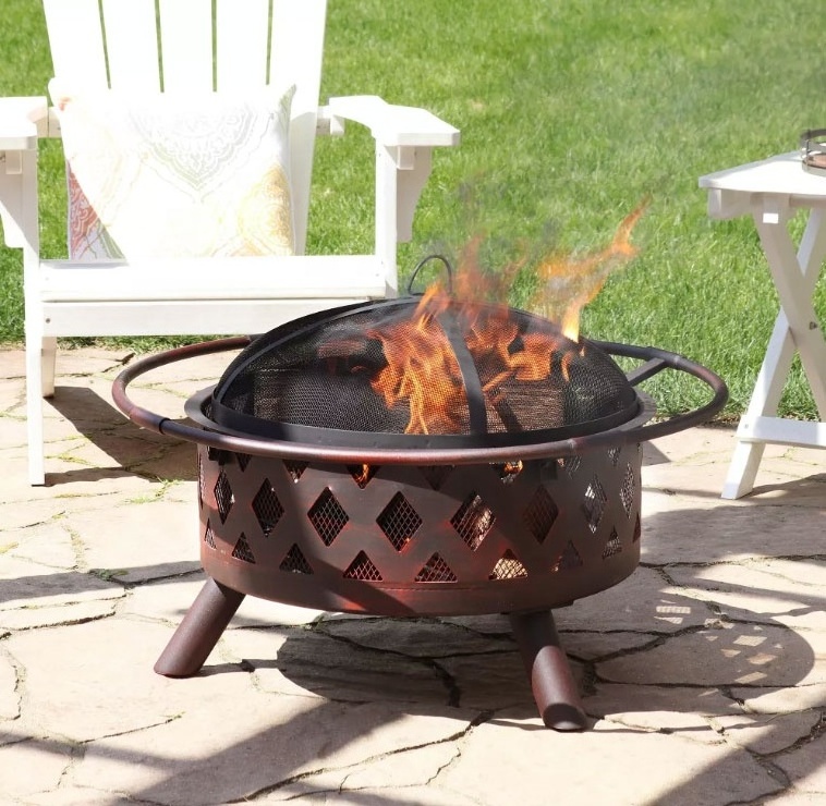 Bronze Outdoor Camping or Backyard Crossweave Cut Out Fire Pit with Spark Screen Log Poker and Metal Wood Grate