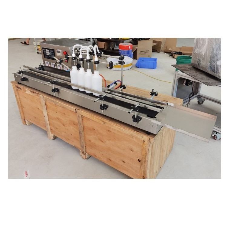 Table Desktop Automatic Liquid Filling Machine 4 Heads with Conveyor Belt pouch juice filling machine dispenser for liquid soap