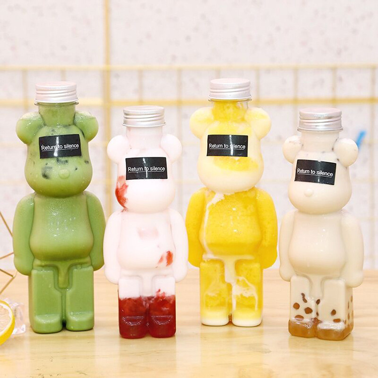 Hot selling 350ml 400ml 500ml 700ml Pet Plastic Bear Shape Juice Bottle for drinking with cap and straps