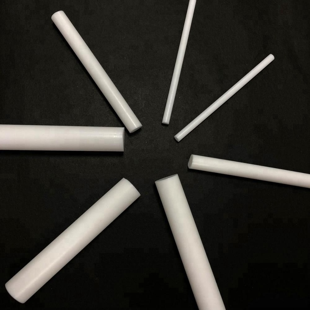 High Temperature Resistance Graphite 100% Virgin Best White PTFE Extruded Bar Moulded Rod And Solid Plastic Rod 2mm Manufacture