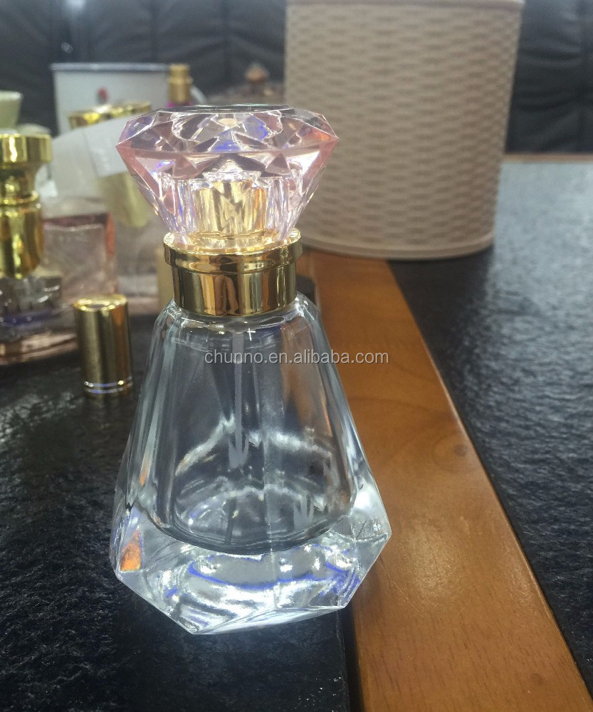 China hot sale 30ml 50ml 100ml triangle perfume glass spray bottle empty diamond shape bottle