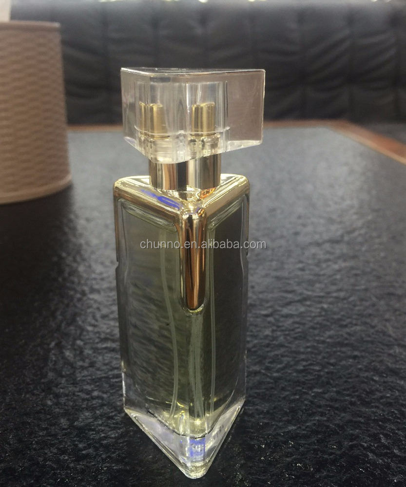 China hot sale 30ml 50ml 100ml triangle perfume glass spray bottle empty diamond shape bottle