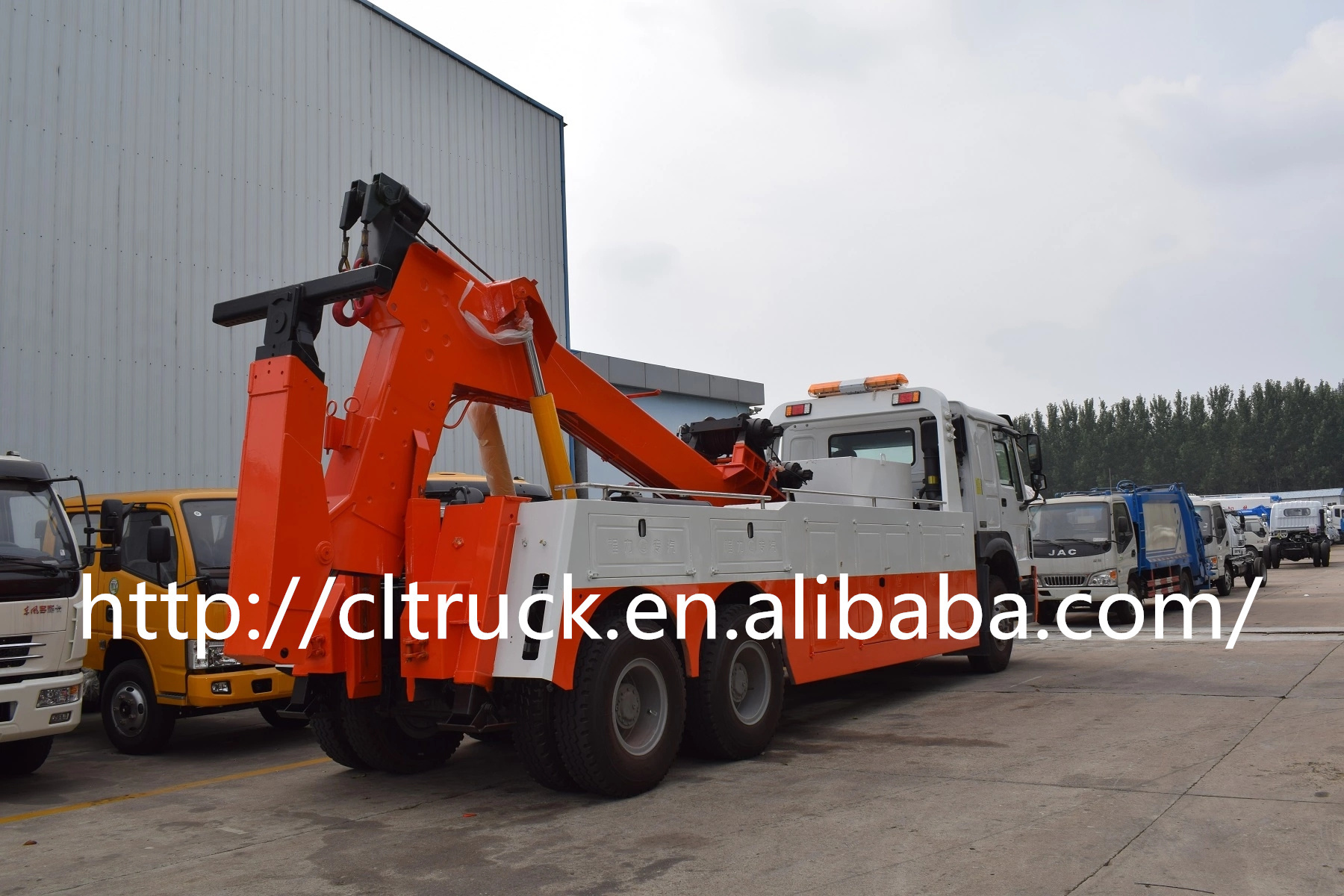 Sinotruk HOWO 12 wheel 360 degree rotating tow wrecker 60 ton and big wrecker for sale