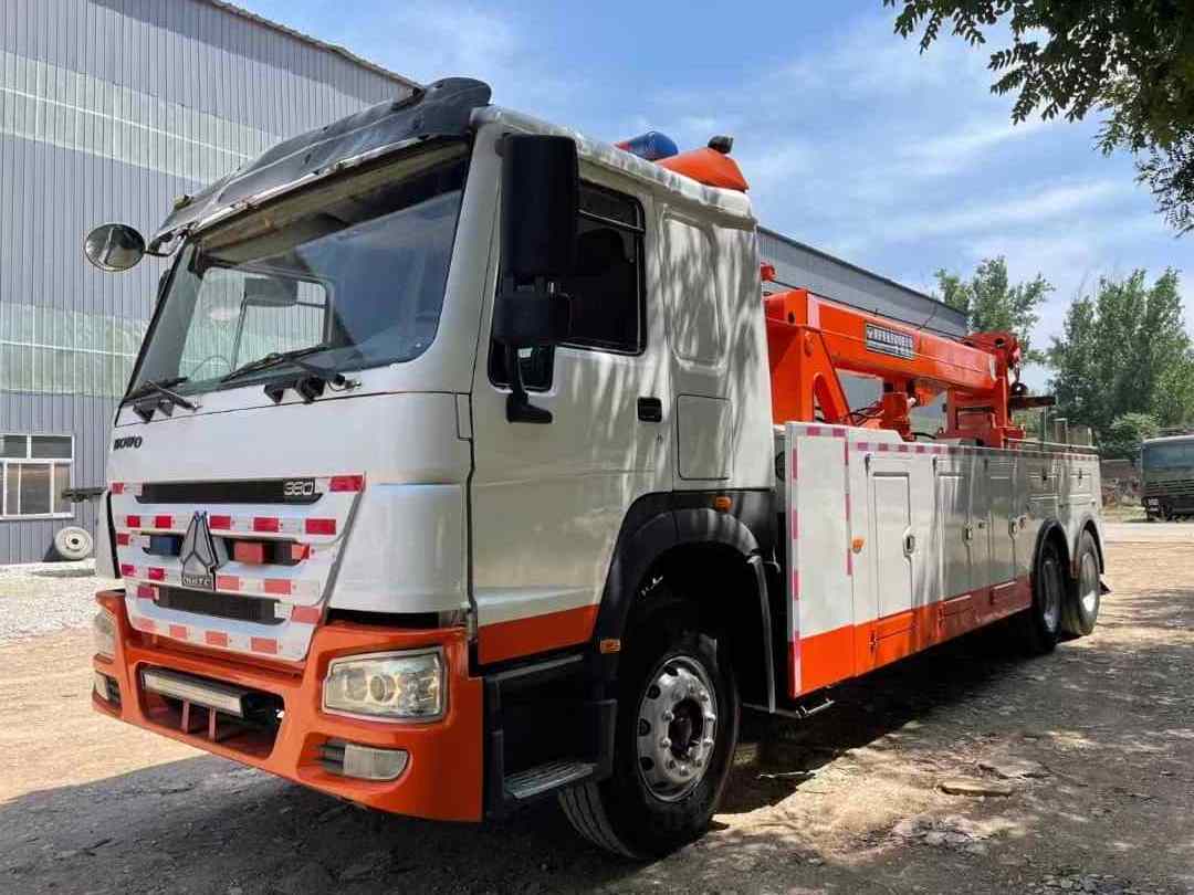 China Sinotruk Howo 70 Tons Wrecker Tow Truck 20Ton Rotator Towing Wrecker Truck Tow Truck Wrecker