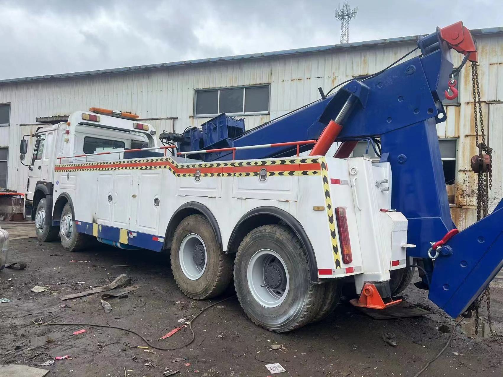 China Sinotruk Howo 70 Tons Wrecker Tow Truck 20Ton Rotator Towing Wrecker Truck Tow Truck Wrecker