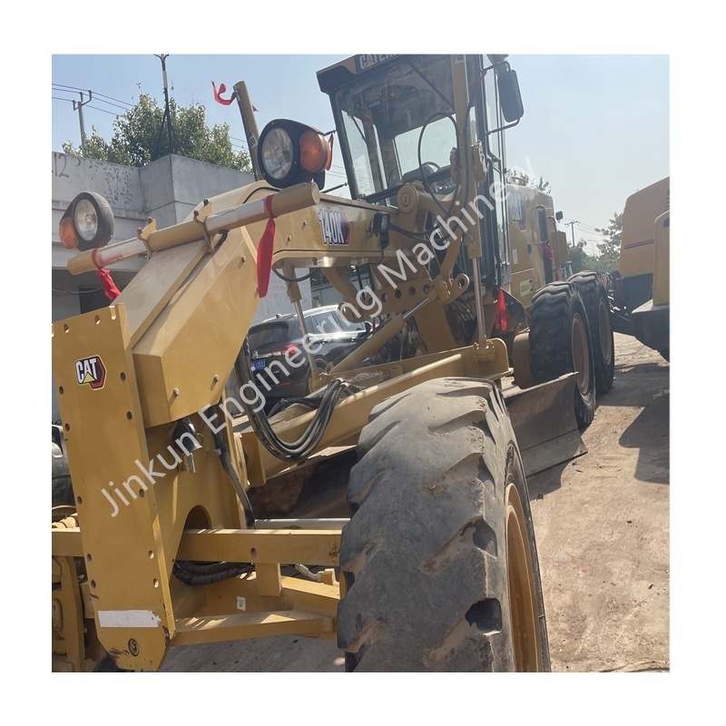 Japan imported CAT 140K used hydraulic tire type car grader sales of cheap distribution