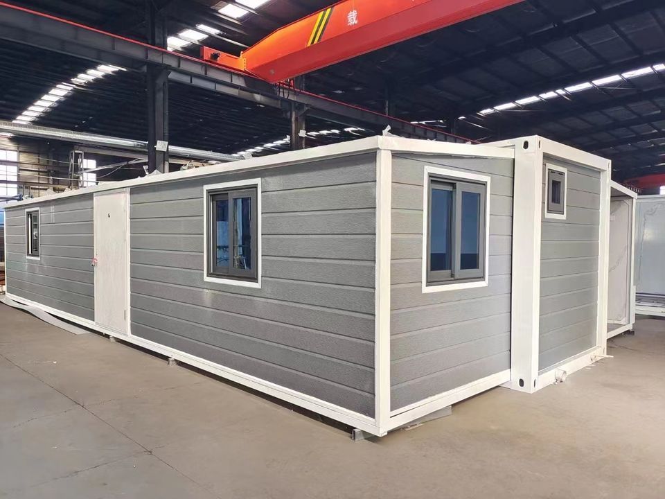 Foldable, insulated, and expandable containers, prefabricated homes, prefabricated foldable activity board houses