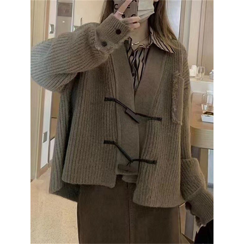 Korean version of autumn and winter new lazy style wooden buckle large knitted cardigan women's loose tassel sweater jacket