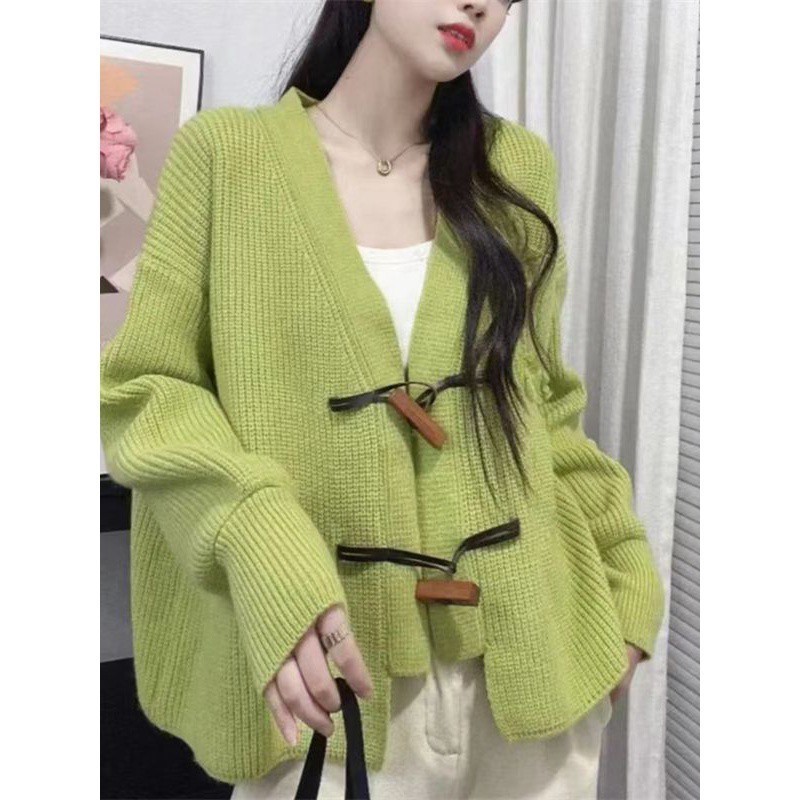 Korean version of autumn and winter new lazy style wooden buckle large knitted cardigan women's loose tassel sweater jacket