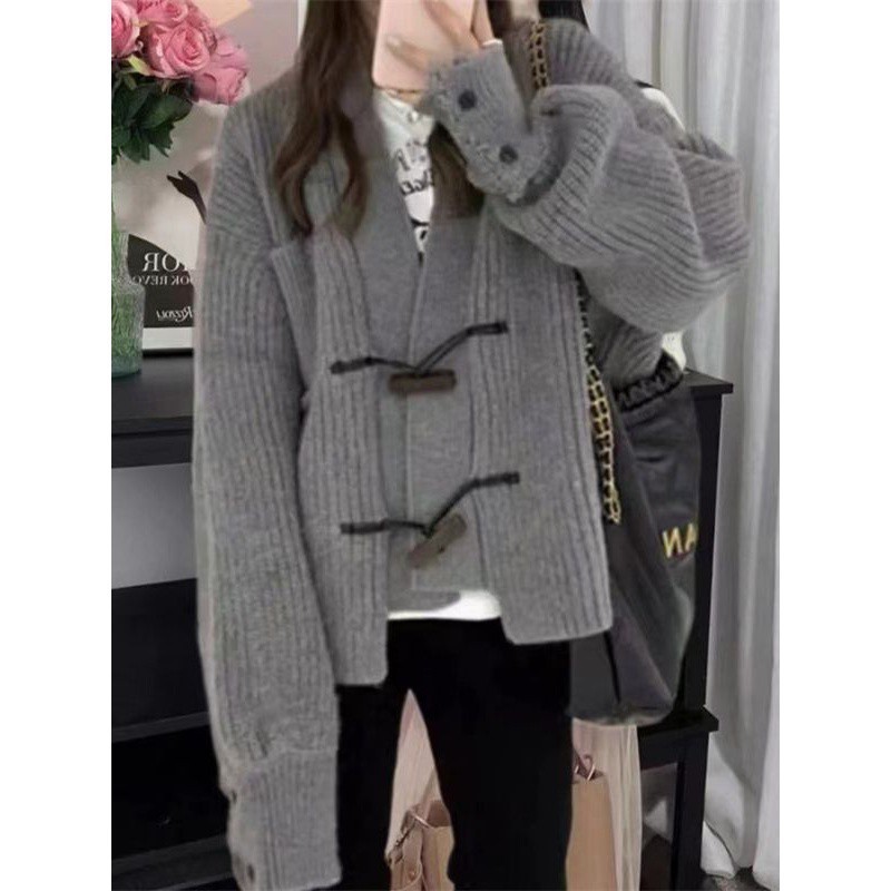 Korean version of autumn and winter new lazy style wooden buckle large knitted cardigan women's loose tassel sweater jacket