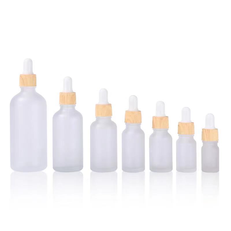 5ml 10ml 20ml 30ml 50ml 100ml Essential Oil Glass Bottle Frosted Clear Glass Dropper  Bottle With Bamboo Printed Lid