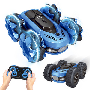 popular 2.4Ghz high speed drifting dancing vehicle with flash light rotation 2 in 1 tires 4wd rc stunt car toy