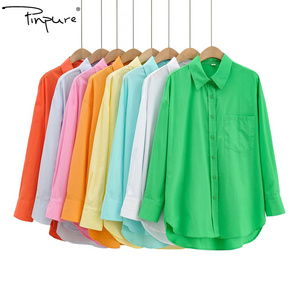 R20922S Autumn new designs women's fashion 8 colors front short back long single pocket shirt top