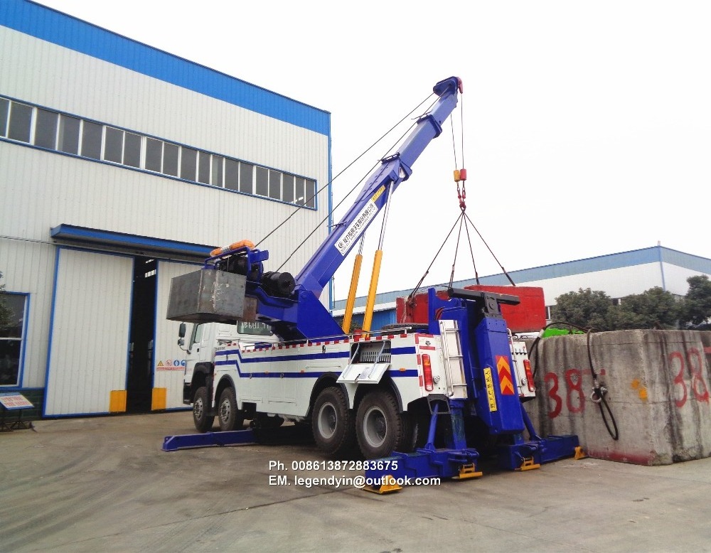 China heavy duty rotate wrecker truck manufacturer Sinotruck HOWO 380HP 8x4 30 tons rotator wrecker truck for sale