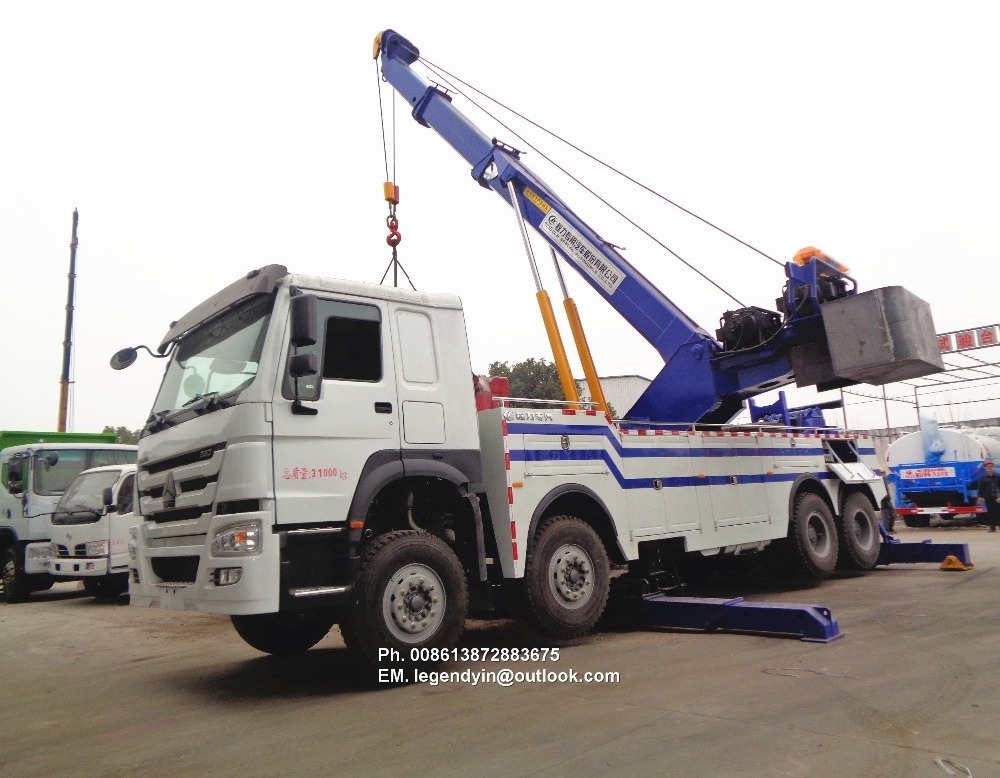 China heavy duty rotate wrecker truck manufacturer Sinotruck HOWO 380HP 8x4 30 tons rotator wrecker truck for sale