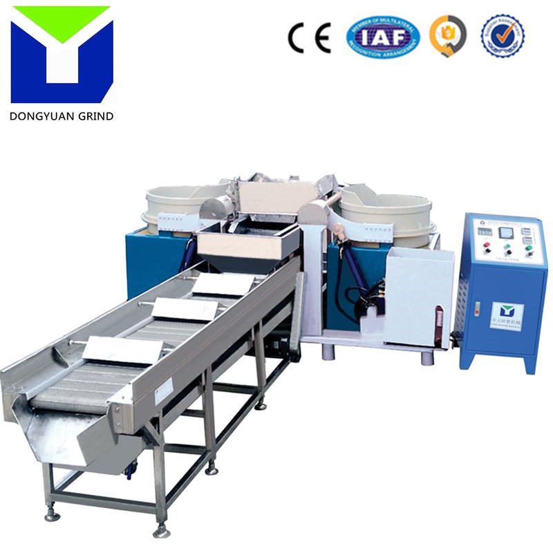 Fully automatic stainless steel parts and gemstone magnetic abrasive polishing machine.