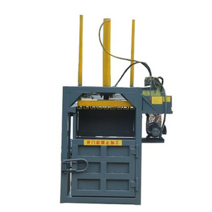 Hydraulic vertical waste paper baler pressing and strapping machine