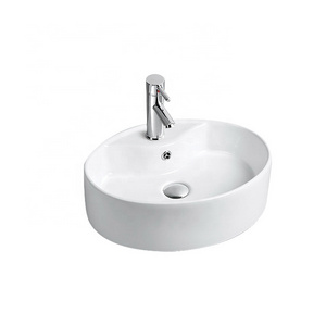 FANNISI Single faucet hold fancy table mounted round ceramic wash basin price