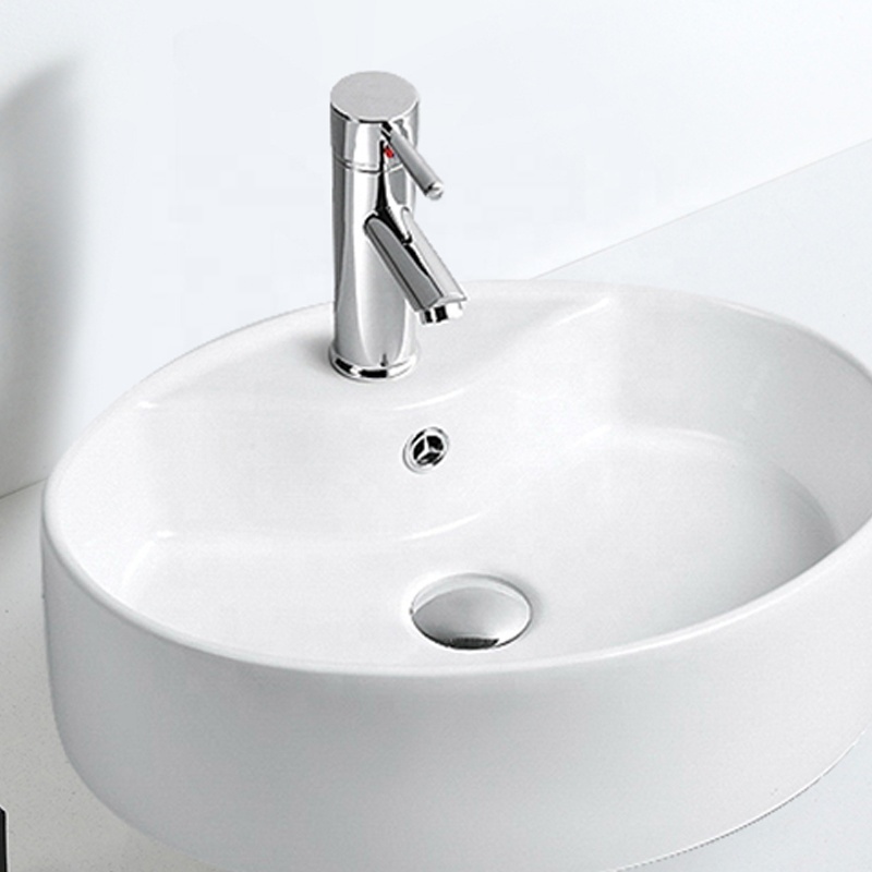 FANNISI Single faucet hold fancy table mounted round ceramic wash basin price