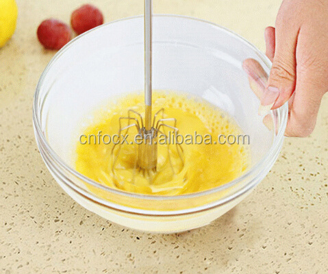 High quality stainless steel egg whisk , hand press egg whisk , hand egg beater