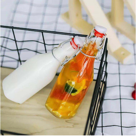 Wholesale Factory price 500ml Empty Clear Drinking Beverage Container Glass Bottle  glass swing top bottle