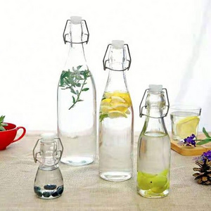 Factory Produced Cylindrical Swing top Glass Bottle