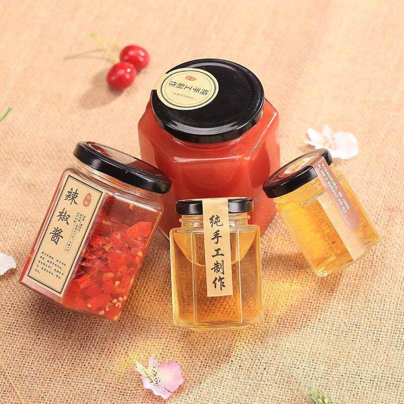 High quality customized  hexagon  shape glass jar for honey jams food storage with lid