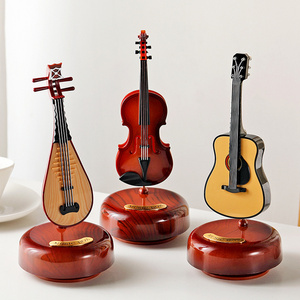 Factory wholesale classical style guitar violin rotating music box for gifts